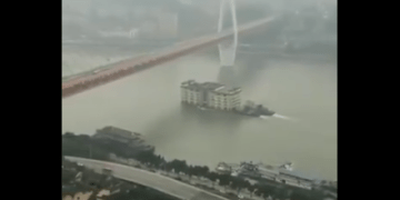 Image from Video of Building Floating Down River in China