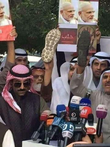 Image about Saudi Arabia People Protest Against Modi Showing Shoes