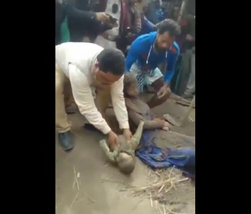 Image about Mother, Child Buried Alive by Hindus in Delhi Riots - Video