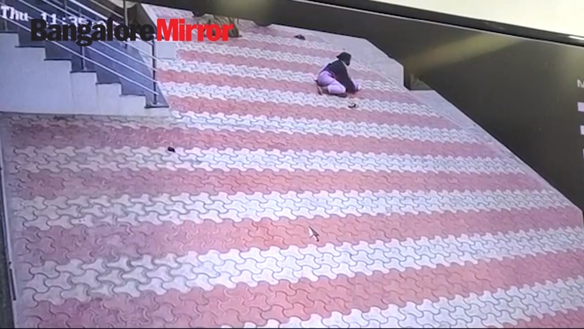 Image of Auto Driver Comes Flying and Crashes Into Woman, Video