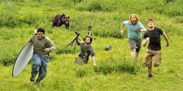Image about Bear Chases National Geographic Crew During Filming